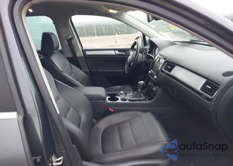 2014 Volkswagen Touareg 3.6L Sport z USA, uszkodzony, nr VIN WVGEF9BP6ED002981